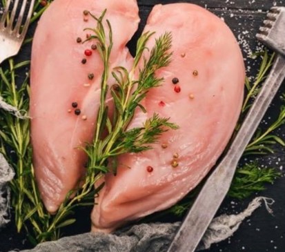 Fresh boneless chicken breasts with herbs
